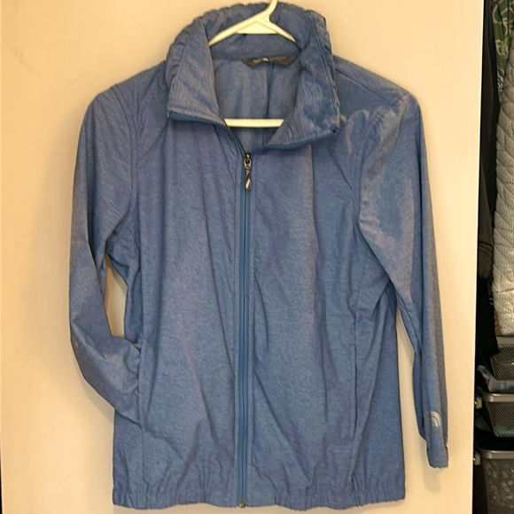 The North Face Jackets & Blazers - The North Face blue spring jacket. 3/4 length sleeves zip up hidden hood.